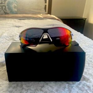 Oakley. 100% authentic sunglasses.